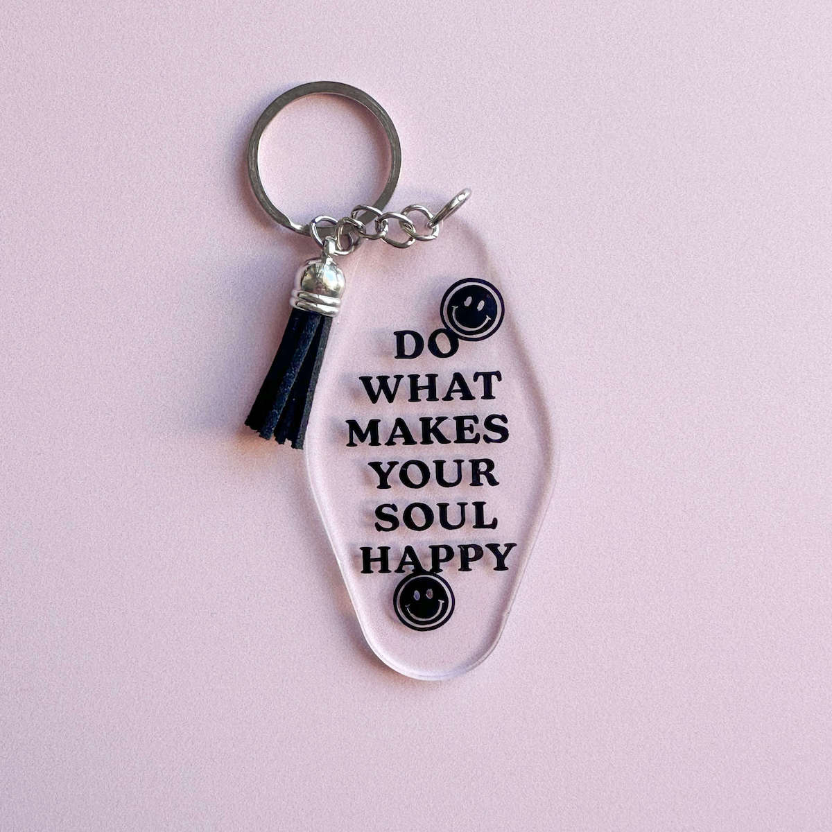 acrylic keychain with black text