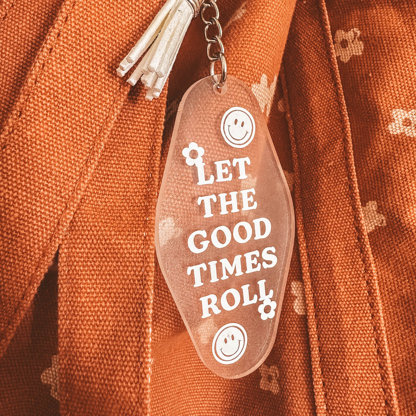 acrylic keyring let the good times roll with white text