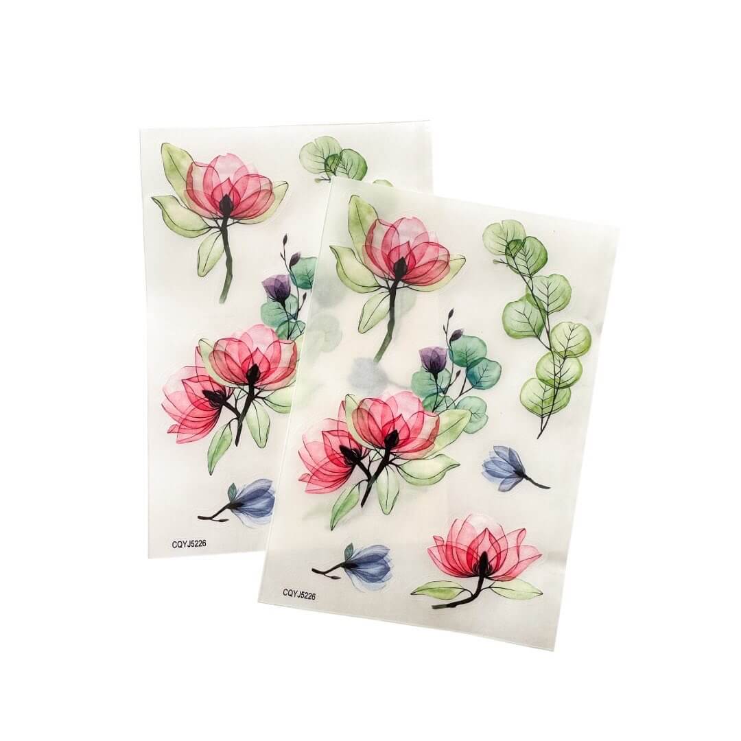 Sticker sheet with transparent backing and beautiful pink flower & green leaves designs.