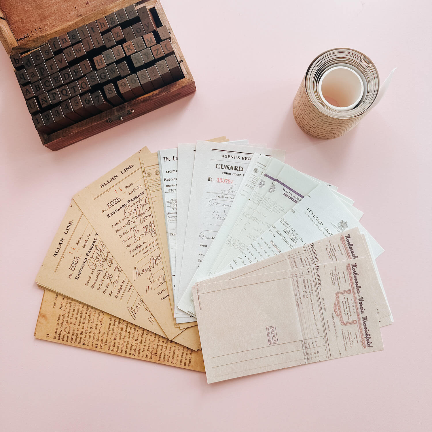 Vintage style paper pack displayed on pink table.