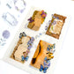 Butterflies and decorative stickers in sticker book