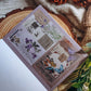 Sticker book page with purple and brown butterfly and decorations