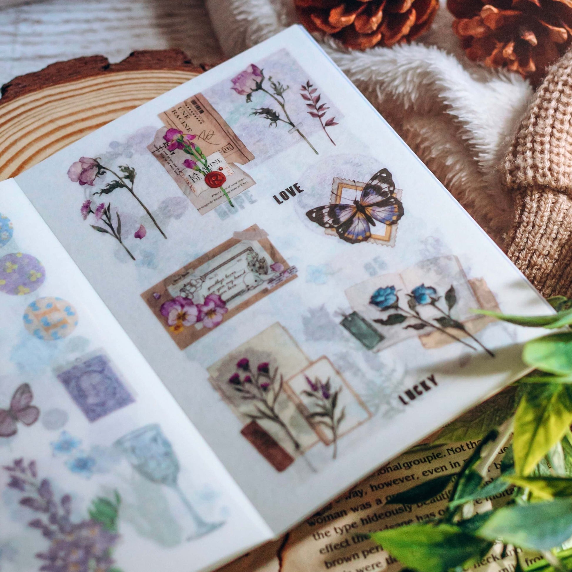 Sticker book page with purple and brown butterfly and decorations