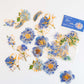 Blue and gold detail flower sticker pack with sticker packaging.