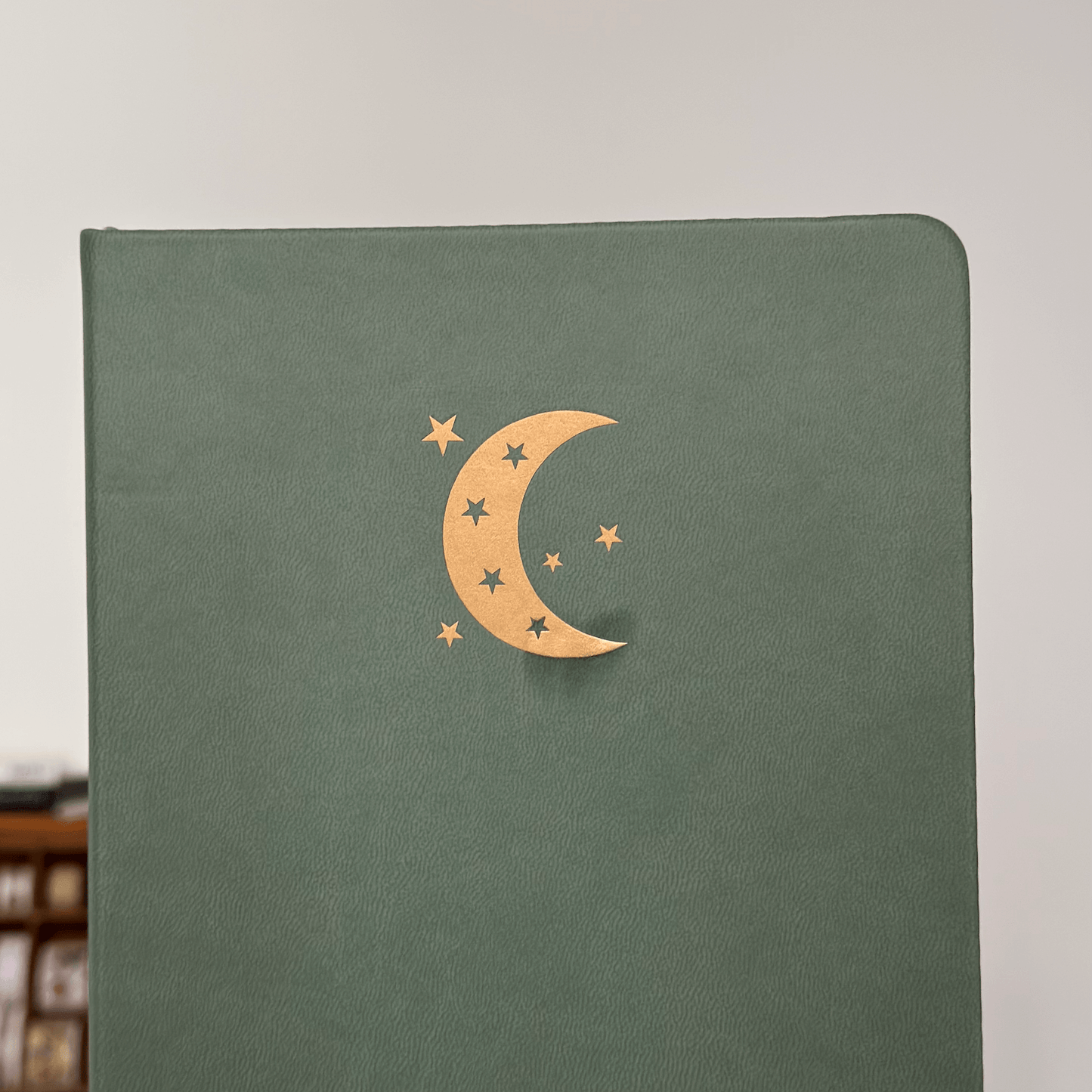 Green PU leather A5 dotted journal - Less than perfect copper moon print (with burn mark)