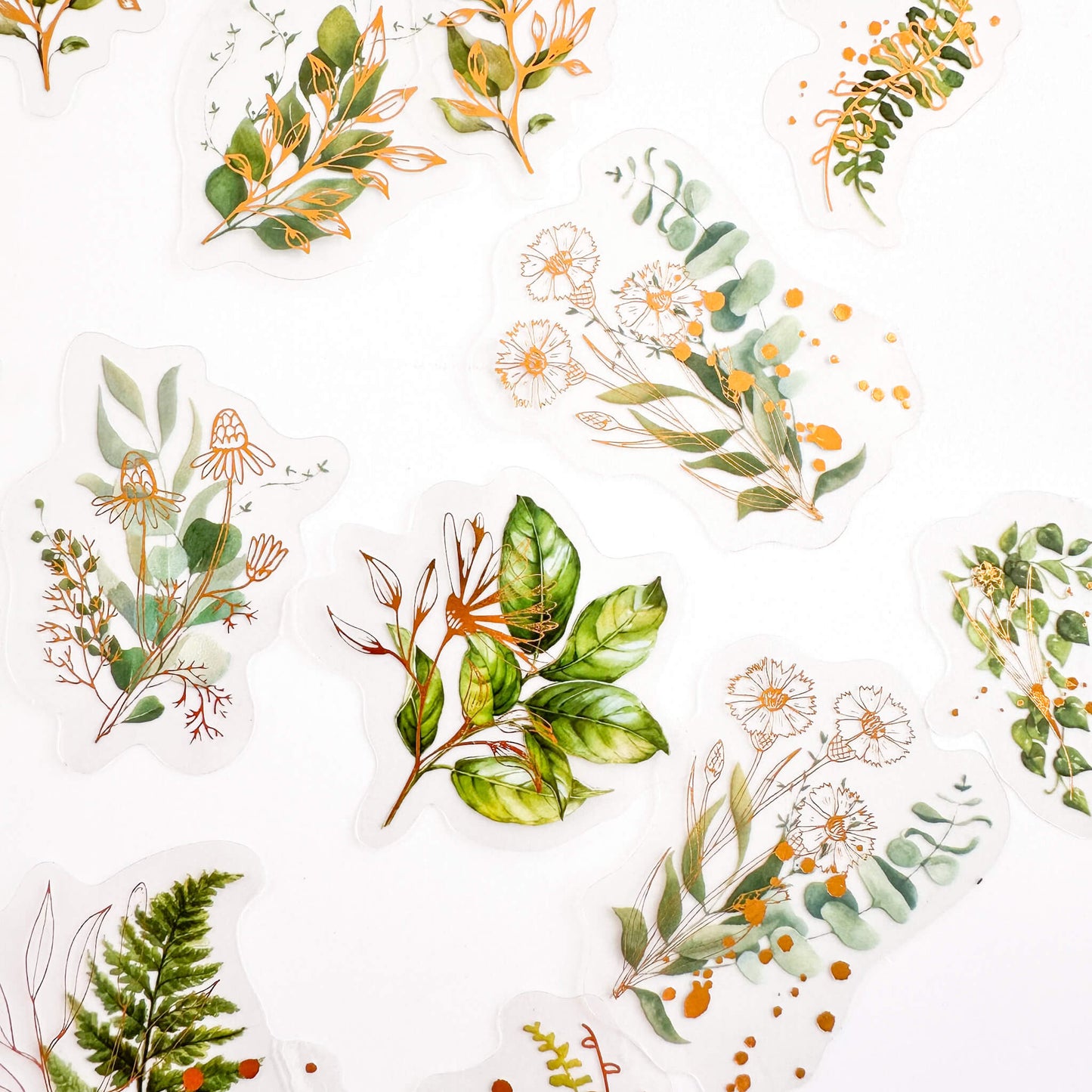 Detail of gold and green leaves stickers. Leaves have a Watercolour look and feel.