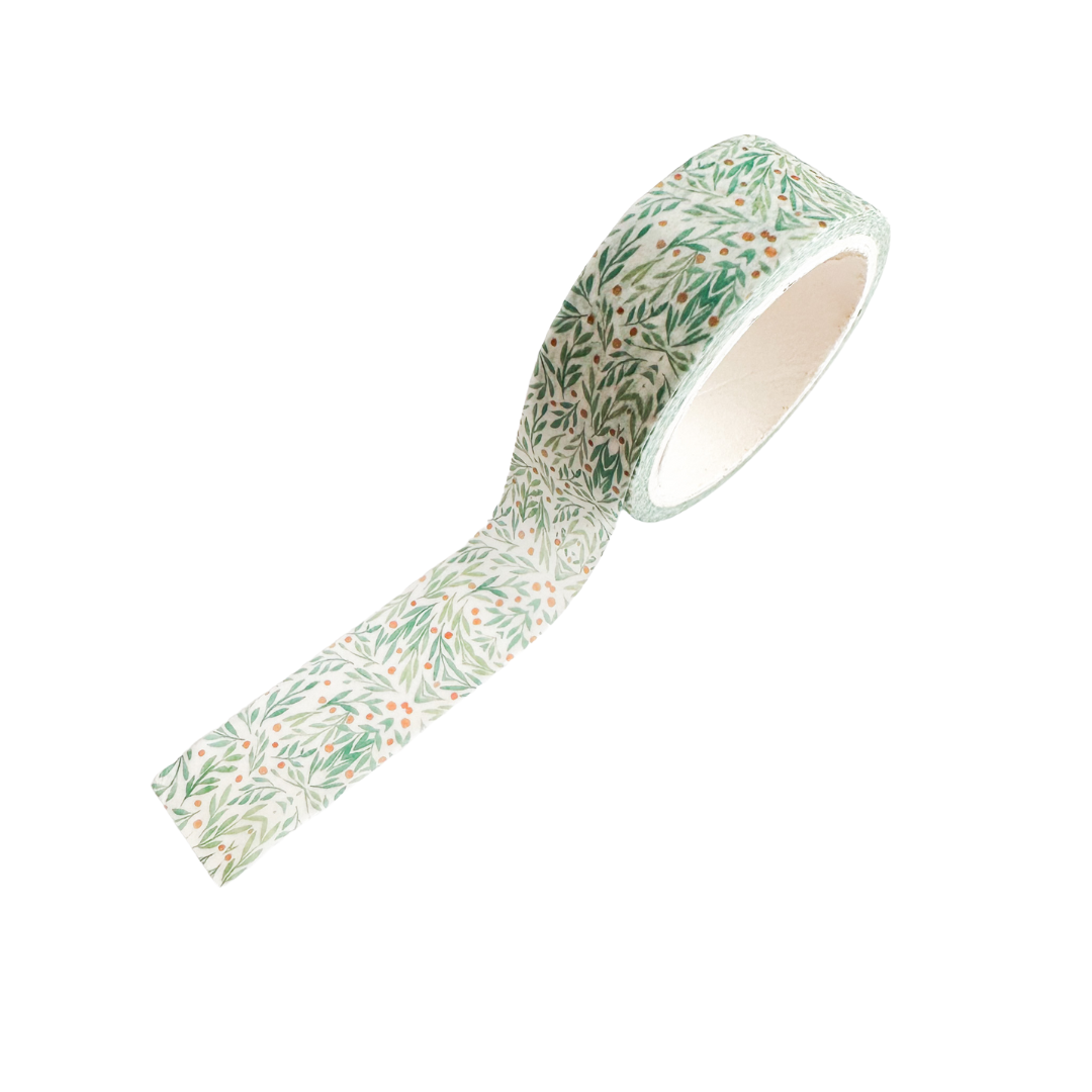 Washi tape roll with green leaf pattern.