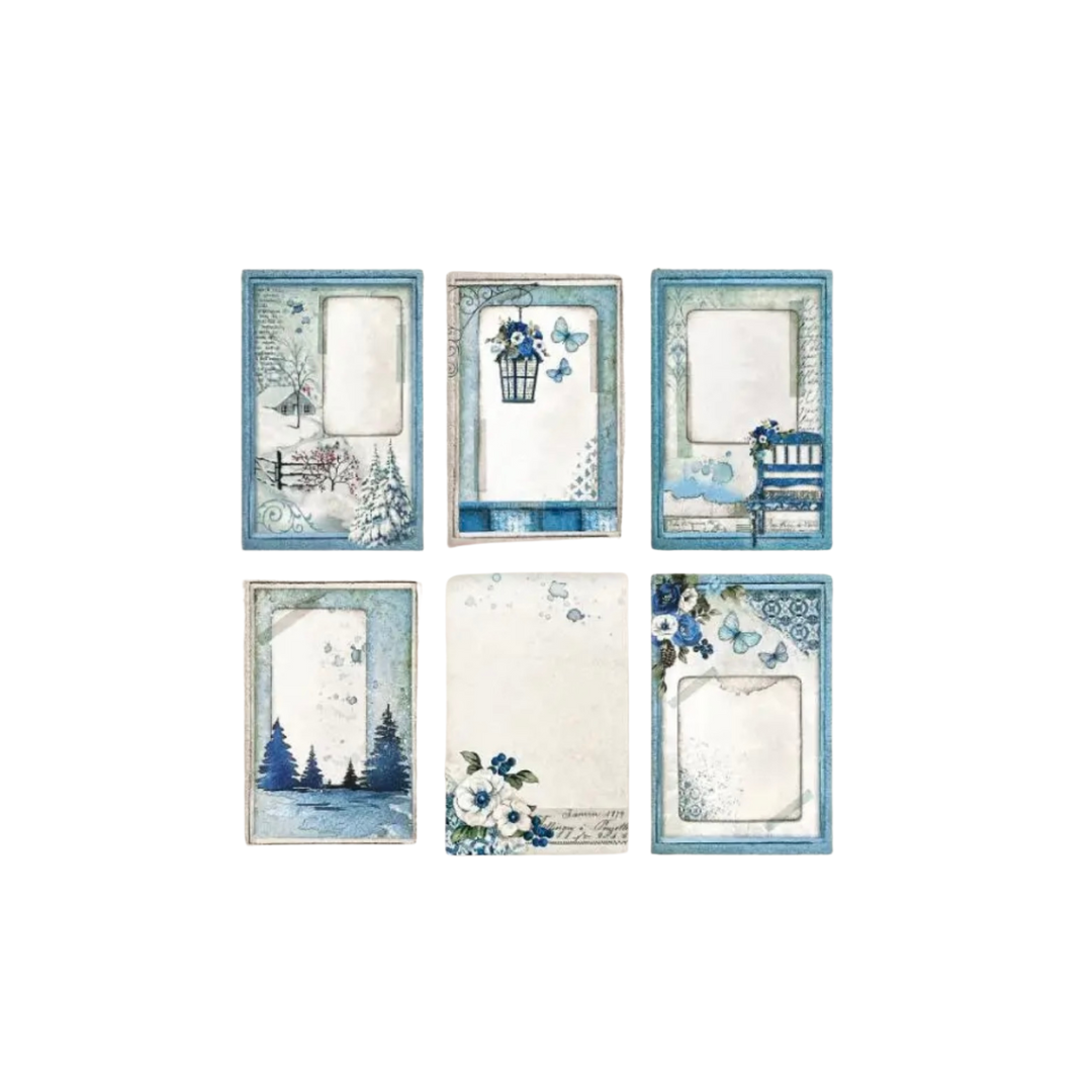 Decorative paper pad with blue bird cage design, Snow and trees and blue bench.