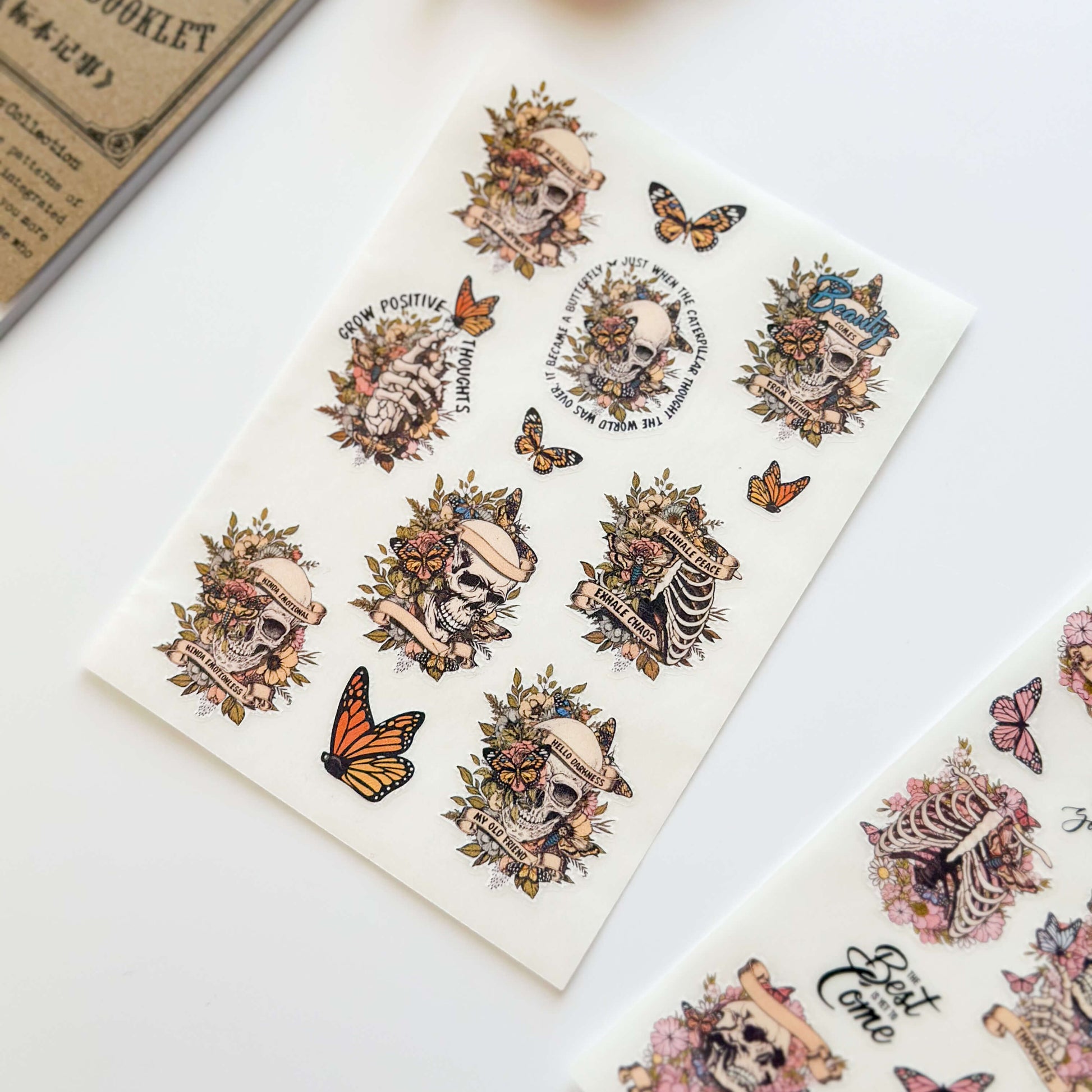 Sticker sheet with orange butterflies and skulls illustrations