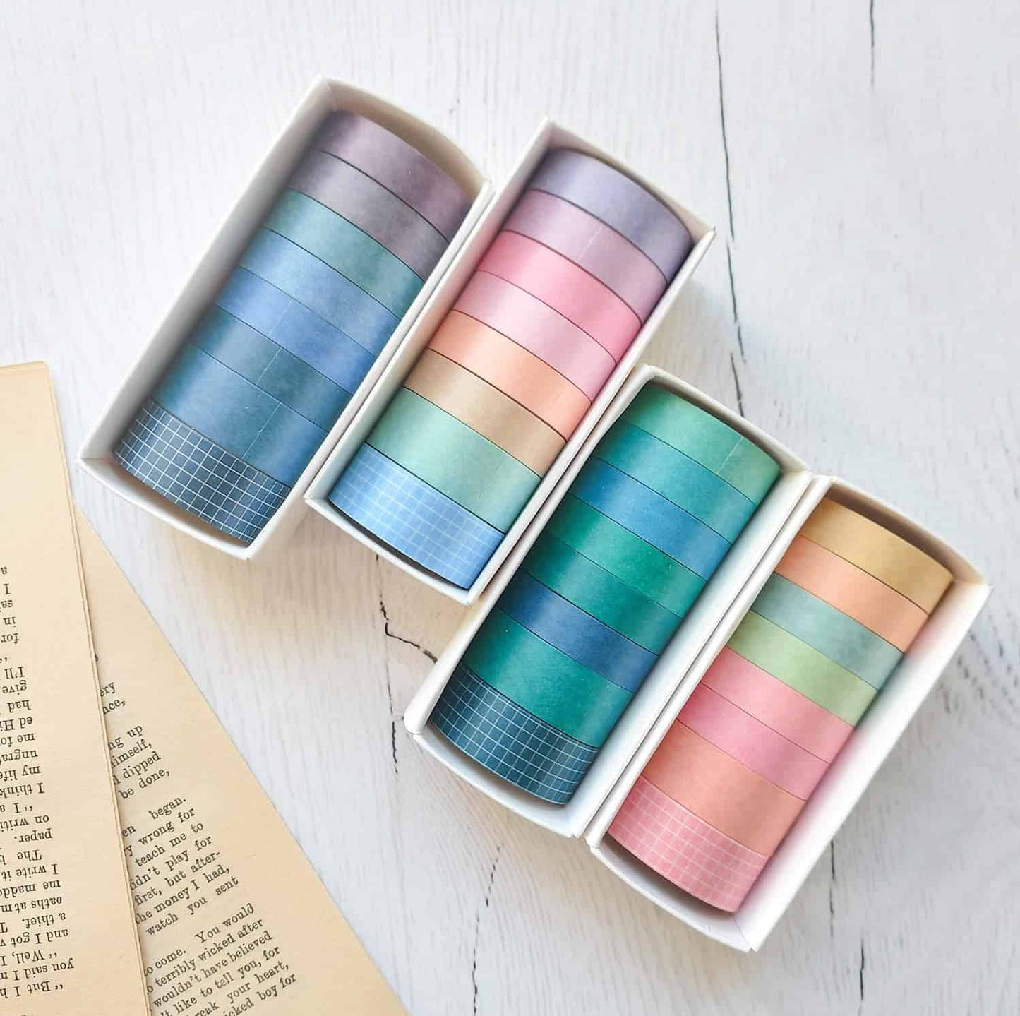 Four sets of different colour washi tapes. Bright, colourful colour combinations.